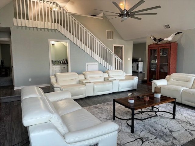 living room with high vaulted ceiling, wood finished floors, visible vents, and a ceiling fan