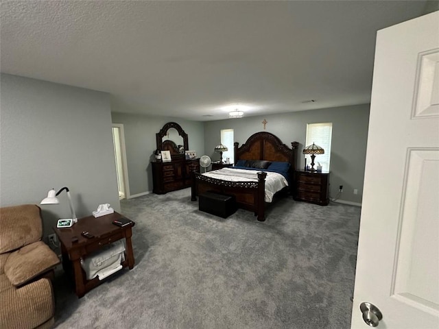 carpeted bedroom with baseboards