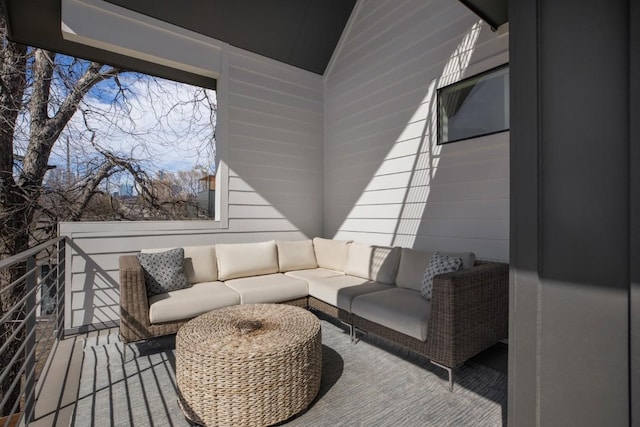 deck featuring outdoor lounge area