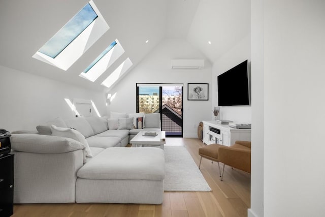 living room with an AC wall unit, high vaulted ceiling, and light wood-style flooring