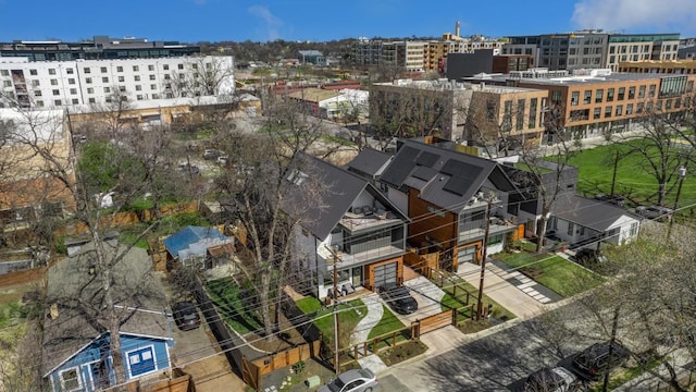 drone / aerial view featuring a city view