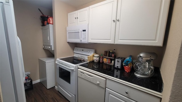 712 W 21st St Unit 202, Austin, TX 78705 - kitchen with white appliances, dark wood-type flooring, and white cabinetry