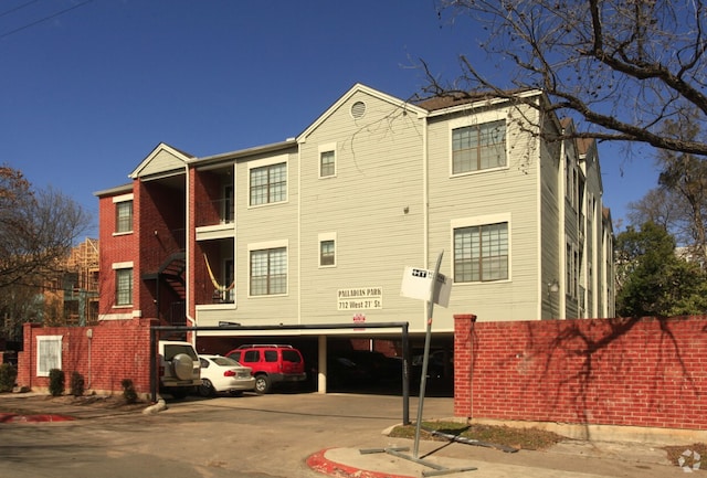 view of property with covered parking