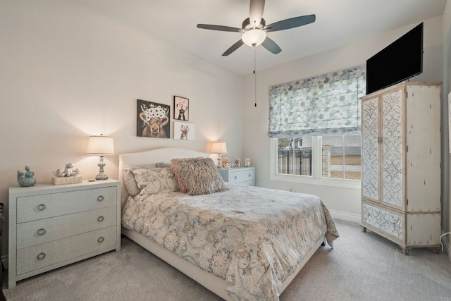 1000 Flint Ridge Trl, Georgetown, TX 78628 - bedroom featuring carpet flooring, baseboards, and a ceiling fan
