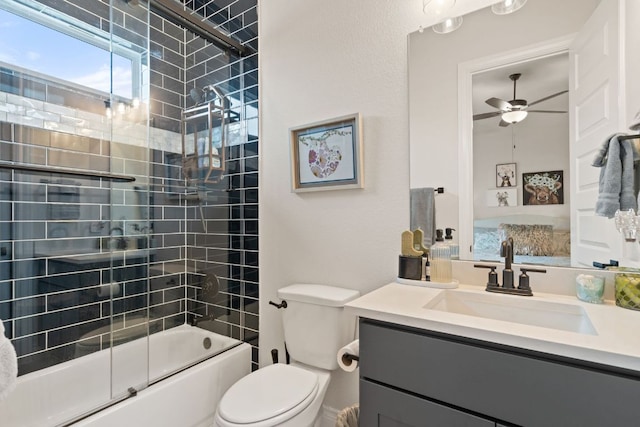 1000 Flint Ridge Trl, Georgetown, TX 78628 - full bath featuring vanity, bath / shower combo with glass door, toilet, ceiling fan, and ensuite bathroom