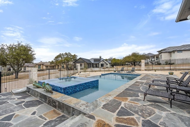 1000 Flint Ridge Trl, Georgetown, TX 78628 - view of pool with a patio, a pool with connected hot tub, and a residential view