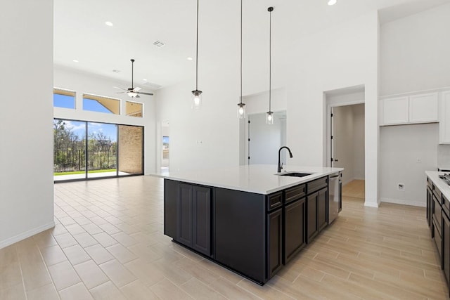 1832 Camay St, Leander, TX 78641 - kitchen featuring ceiling fan, a high ceiling, open floor plan, light countertops, and dishwasher