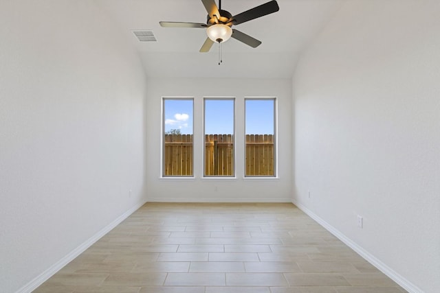 1832 Camay St, Leander, TX 78641 - spare room featuring a ceiling fan, lofted ceiling, and light wood-style floors
