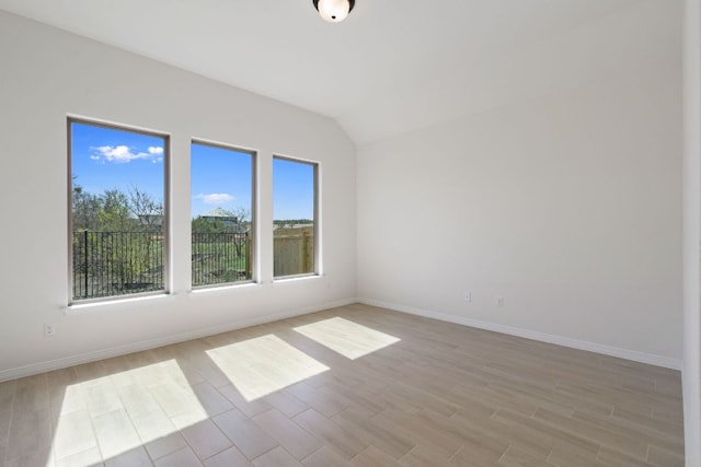 1832 Camay St, Leander, TX 78641 - spare room with light wood-style flooring and vaulted ceiling