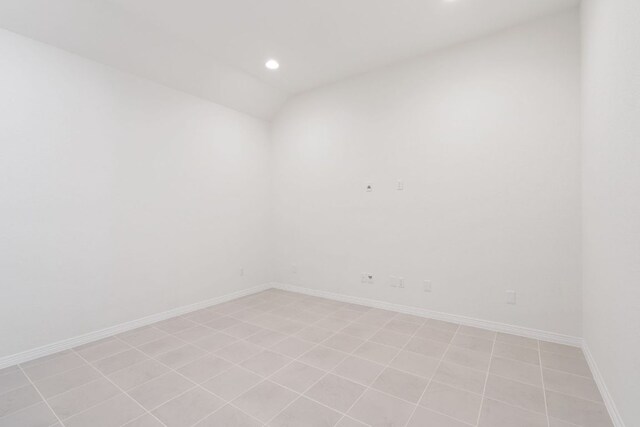 1832 Camay St, Leander, TX 78641 - spare room featuring recessed lighting, vaulted ceiling, and light tile patterned flooring