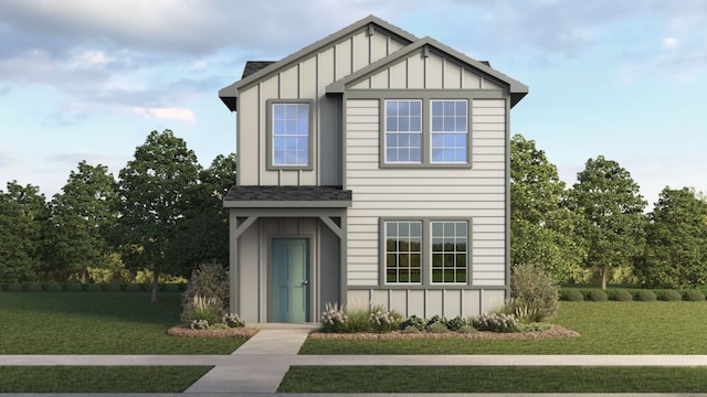 view of front of home featuring a front lawn, board and batten siding, and roof with shingles