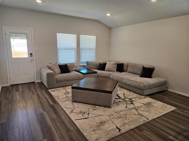 living area featuring lofted ceiling, baseboards, recessed lighting, and wood finished floors