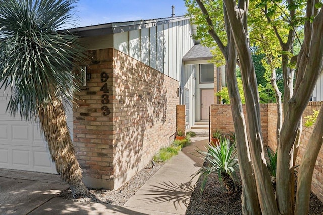 9433 Singing Quail Dr, Austin, TX 78758 - view of property exterior with brick siding