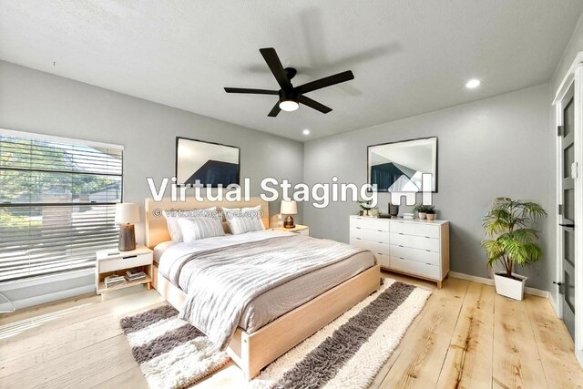 bedroom with light wood-style floors, recessed lighting, a ceiling fan, and baseboards