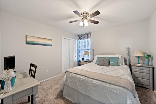 bedroom featuring carpet floors, a closet, baseboards, and a ceiling fan