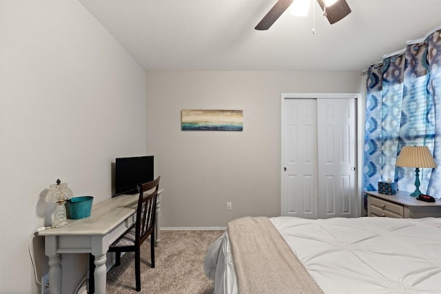 carpeted bedroom with baseboards, a ceiling fan, and a closet