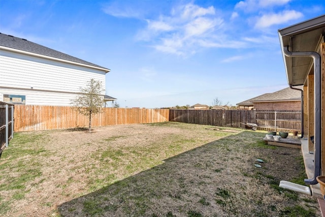 view of yard featuring a fenced backyard