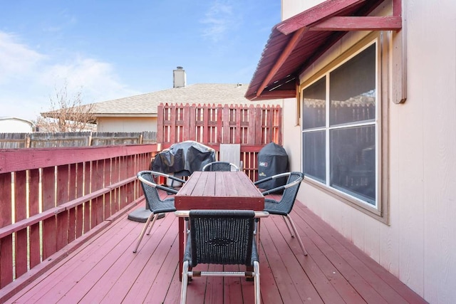 103 Ryan Cv, Hutto, TX 78634 - deck with outdoor dining space and a grill