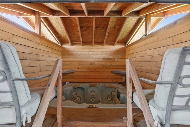 103 Ryan Cv, Hutto, TX 78634 - stairs featuring lofted ceiling, wooden walls, and a relaxing sauna