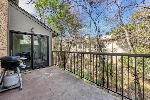 view of patio with a balcony and area for grilling