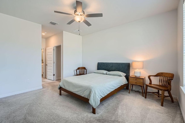 bedroom featuring a ceiling fan, light colored carpet, visible vents, and baseboards