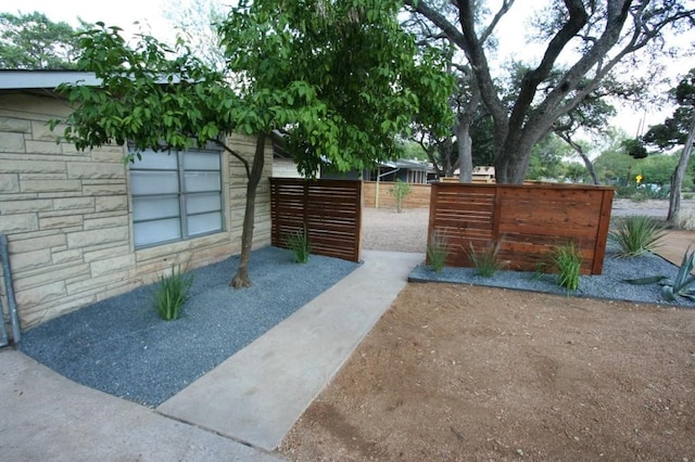 view of gate with fence