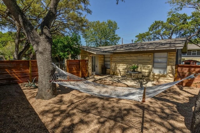 view of outdoor structure featuring fence