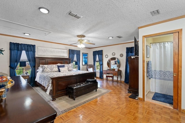 bedroom featuring visible vents, a textured ceiling, and ornamental molding