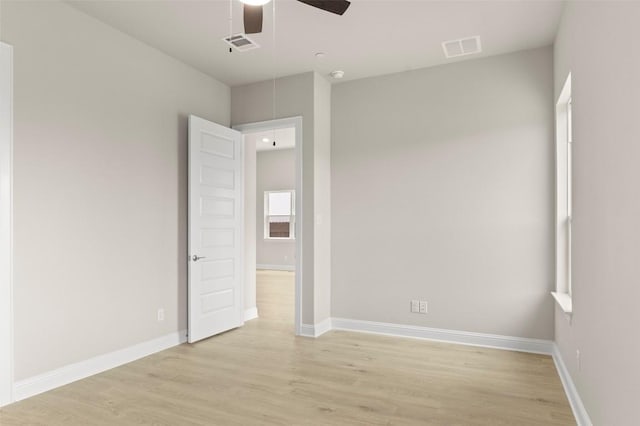 600 C-Bar Ranch Trl, Cedar Park, TX 78613 - unfurnished room featuring attic access, light wood-style floors, a ceiling fan, and baseboards