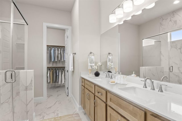 600 C-Bar Ranch Trl, Cedar Park, TX 78613 - full bathroom with marble look tile flooring, a marble finish shower, double vanity, baseboards, and a spacious closet
