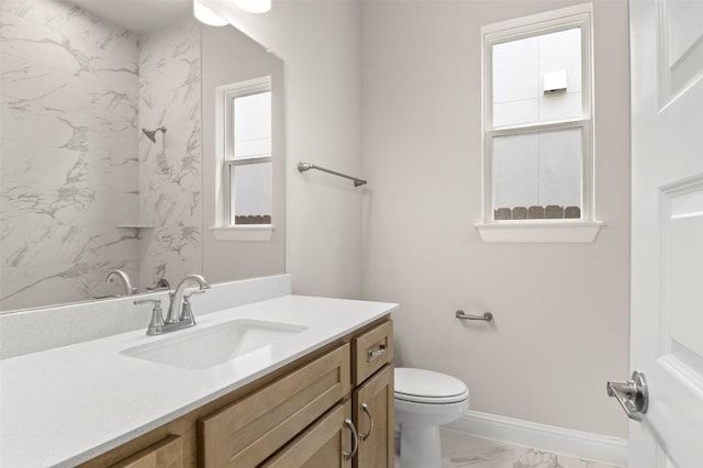 600 C-Bar Ranch Trl, Cedar Park, TX 78613 - full bathroom featuring marble look tiles, vanity, toilet, a shower, and baseboards