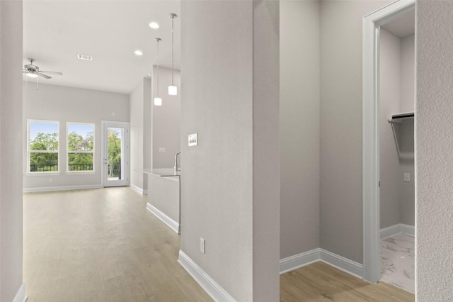 600 C-Bar Ranch Trl, Cedar Park, TX 78613 - hallway featuring light wood-style flooring, baseboards, and recessed lighting