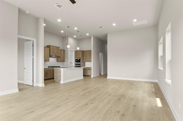 600 C-Bar Ranch Trl, Cedar Park, TX 78613 - unfurnished living room with a sink, recessed lighting, light wood-style floors, baseboards, and a ceiling fan