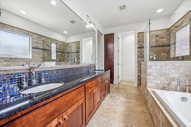 3816 Ridgelea Dr Unit A, Austin, TX 78731 - full bathroom featuring a shower stall, double vanity, a garden tub, tasteful backsplash, and recessed lighting