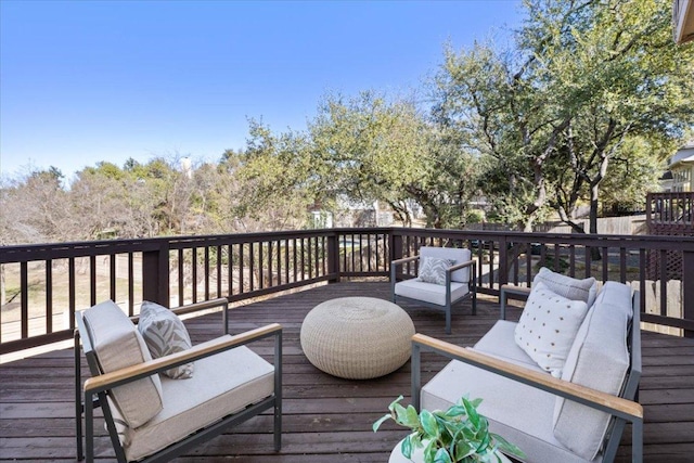 deck featuring outdoor lounge area