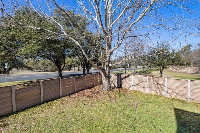 view of yard featuring fence