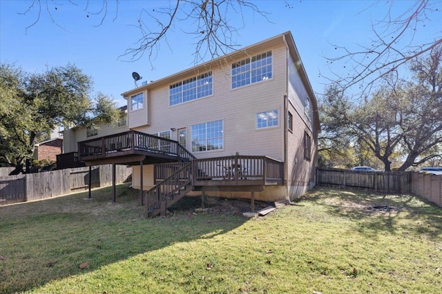 back of house with a yard, stairway, a fenced backyard, and a wooden deck