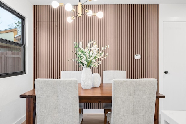 dining room featuring a notable chandelier