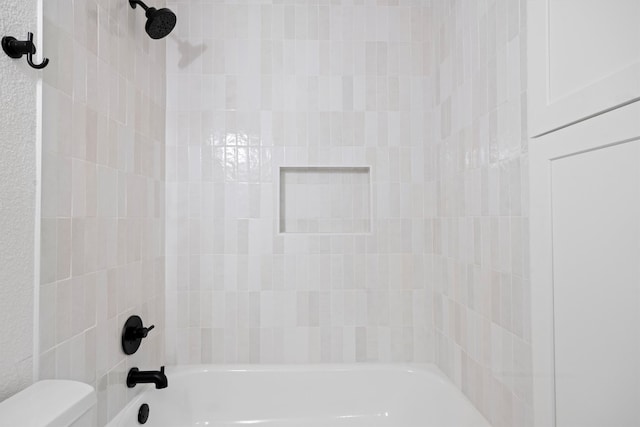 full bathroom with toilet and shower / bathtub combination