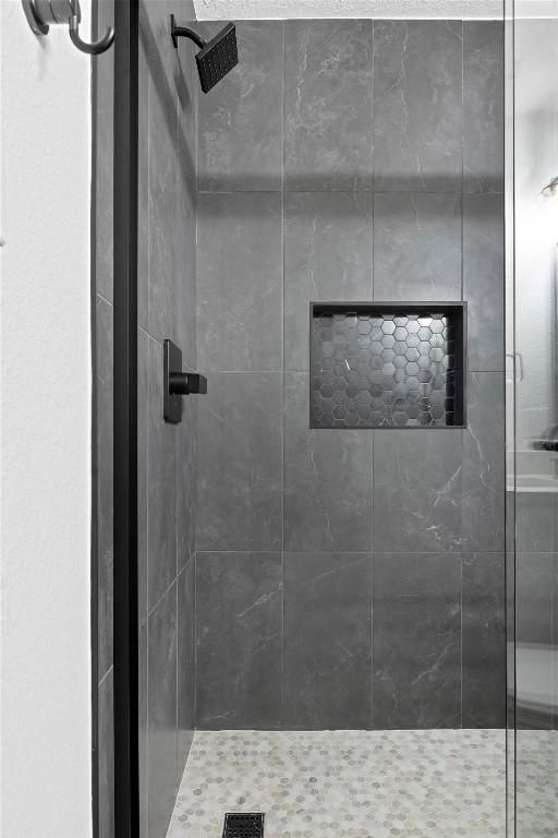 bathroom with a stall shower