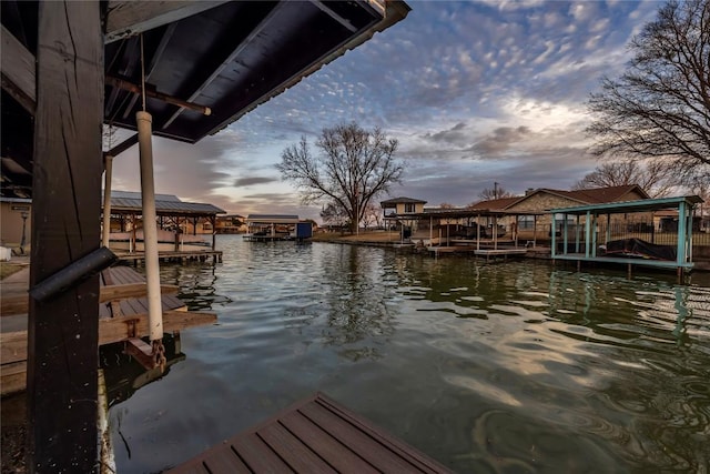 view of dock with a water view and boat lift