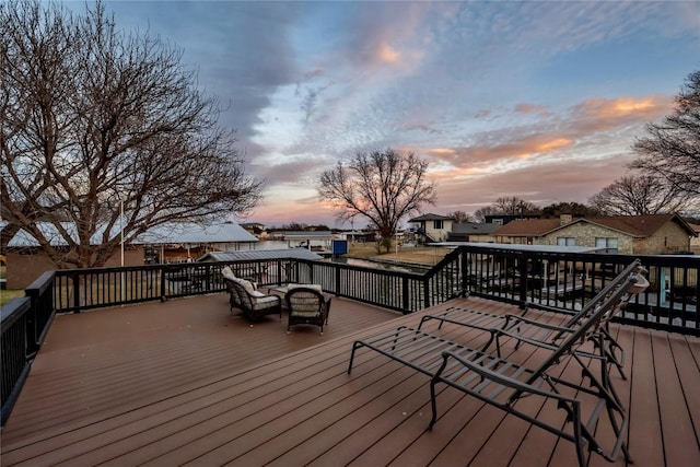 wooden deck featuring a residential view