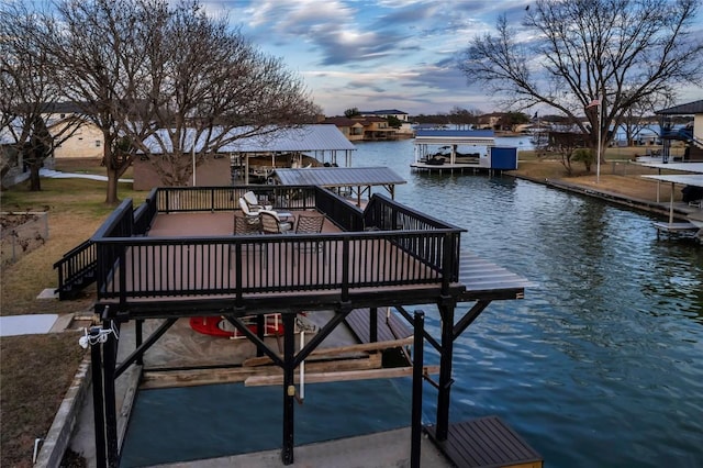 dock area featuring a water view