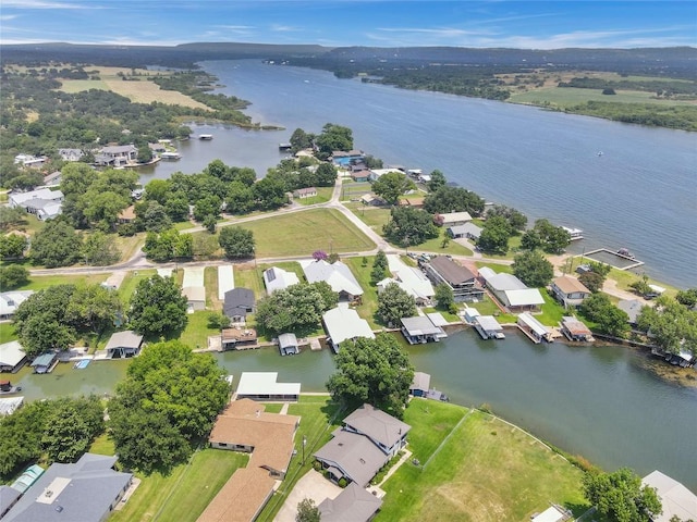 bird's eye view with a water view and a residential view