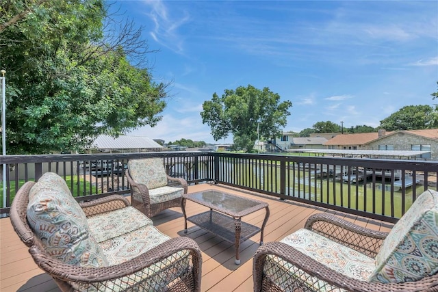 wooden deck with an outdoor hangout area