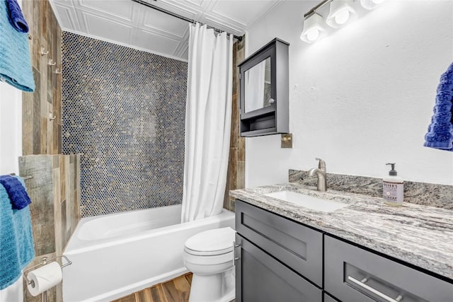 bathroom featuring toilet, vanity, shower / bath combination with curtain, and wood finished floors