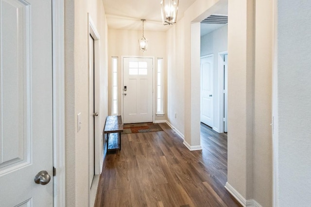 4337 Buffalo Ford Rd, Georgetown, TX 78628 - foyer entrance with dark wood-style flooring and baseboards