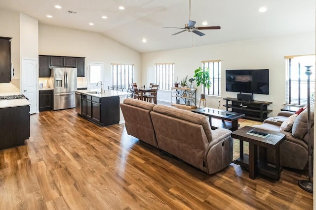 4337 Buffalo Ford Rd, Georgetown, TX 78628 - living room featuring plenty of natural light, wood finished floors, a ceiling fan, recessed lighting, and high vaulted ceiling