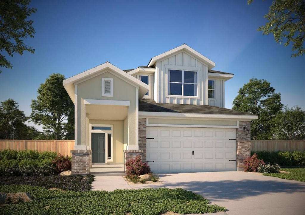 craftsman-style home featuring an attached garage, fence, concrete driveway, stone siding, and board and batten siding