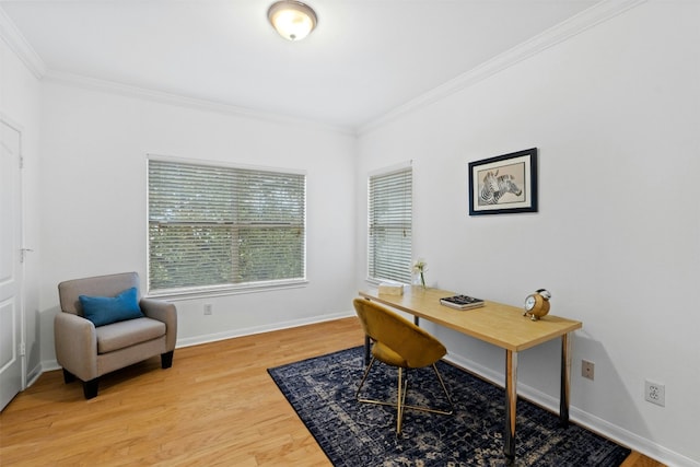 home office featuring crown molding, baseboards, and wood finished floors